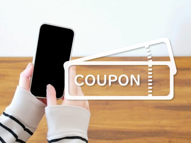 旅行とクーポンのイメージ